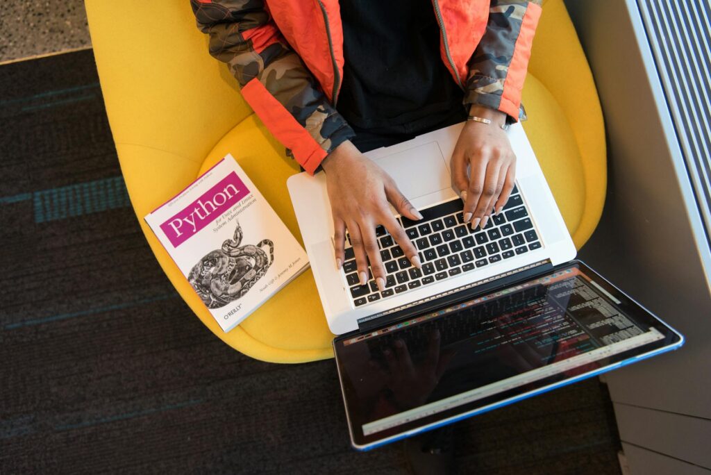 woman programming on a notebook